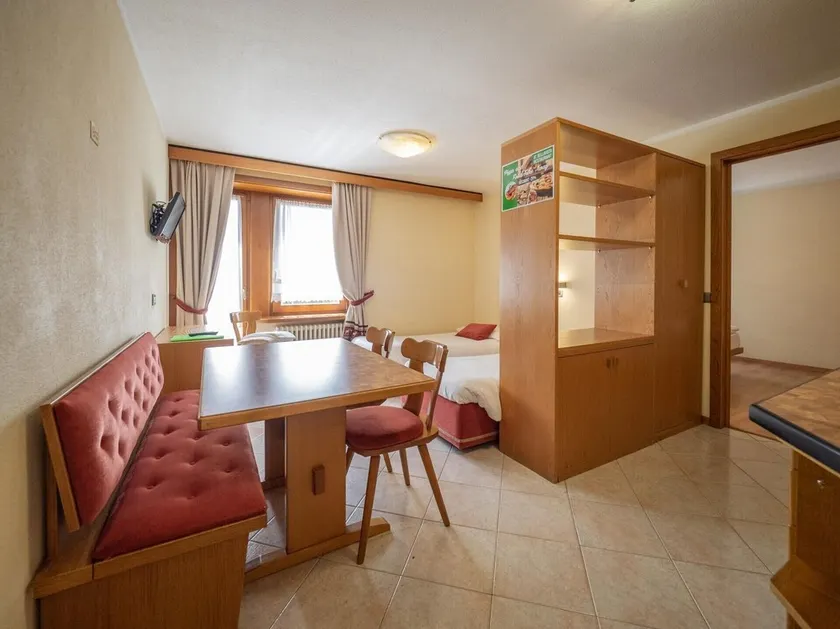 Simple, yet traditional. The two-room apartment at Residence Livigno will leave - Image 1
