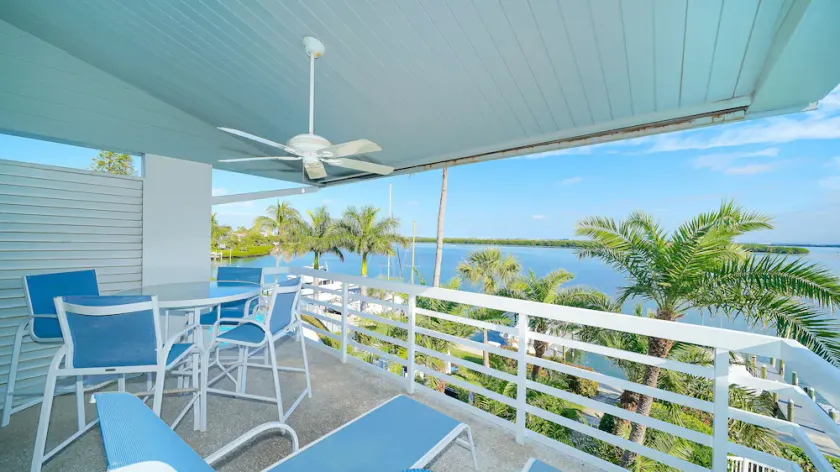Updated 2B/2B with a beautiful view of the bay right from the patio! - Image 1