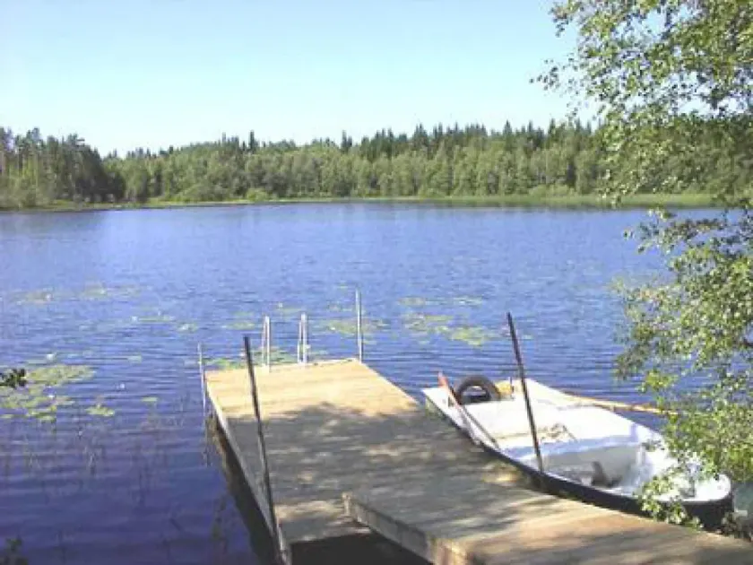 Typical red and white holiday home in the forests of Småland not far from the lake with boat, internet and sauna by the lake - Image 1
