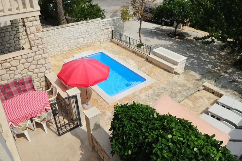 3-Zimmer-Ferienwohnung mit Pool Supetar, Brac (A-11360-a) - Image 1