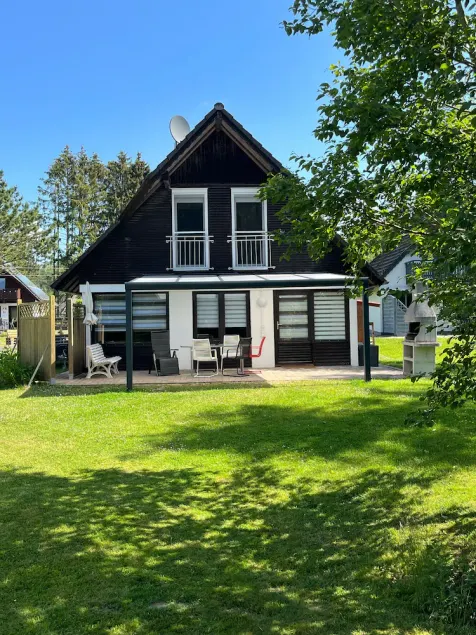 Beautiful holiday home on the edge of the forest in the Silbersee holiday park: Sky children's scooter bicycles - Image 1