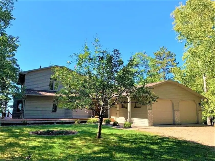 Magnificent 5 bedroom retreat home with beautiful sand beach on Whitefish Lake - Image 1