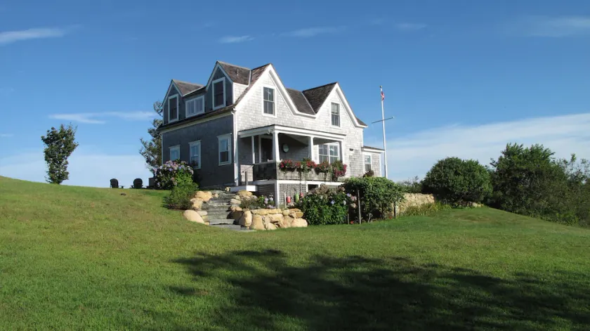Charming 3BR Cottage Perched above the Sea Offers Spectacular Ocean Sunsets - Image 1