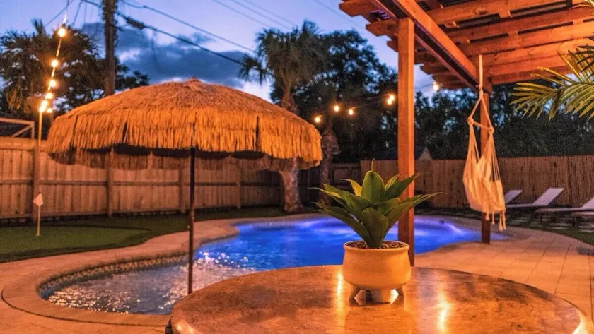 The Palm Garden · Palm Beach Villa Retreat w Pool: Near Beach & Golf - Image 1