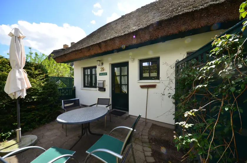 Historical Thatched with a separate entrance with transom windows and shutters - Image 1