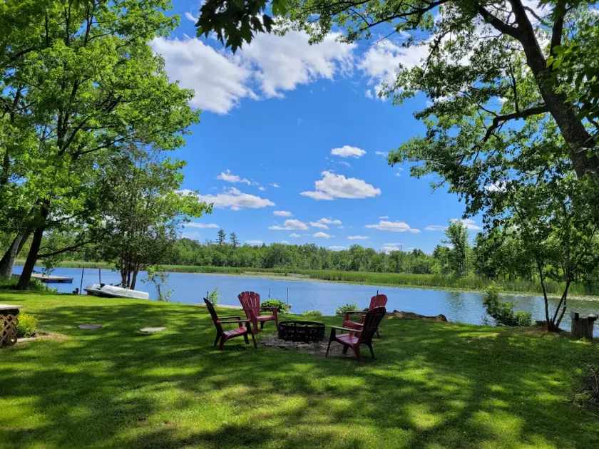 Start each morning on the porch with warm sunshine and beautiful waterfront view - Image 1