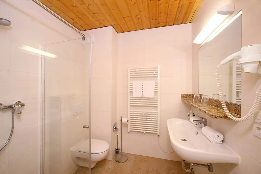 Staudi's ski hut vacation apartment Top1 in hut style directly on the slopes Stove - Image 1
