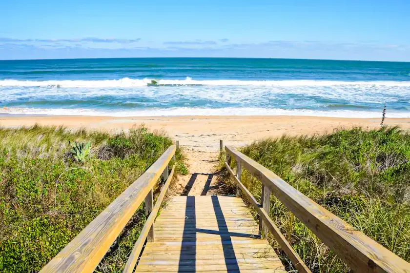 Gorgeous coastal getaway with large yard, firepit, & screened porch - Image 1