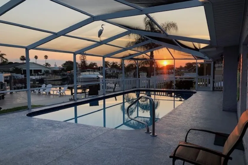 2019 Lowe Pontoon, Mercury 115. Heated, caged, salt water pool on canal. Pets ok - Image 1