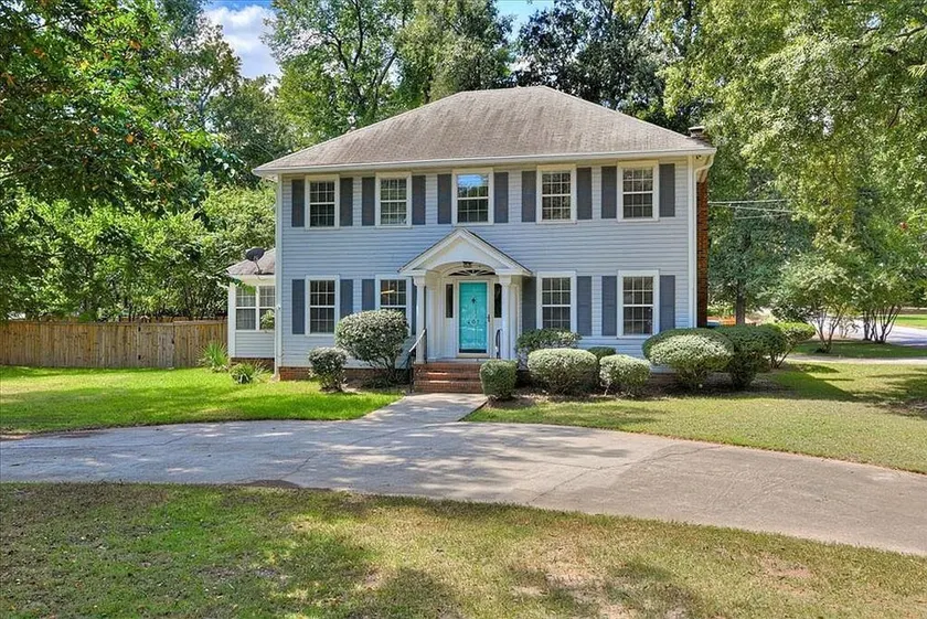 Plantation Styled Home with Sunroom and Large Deck/Yard - Image 1