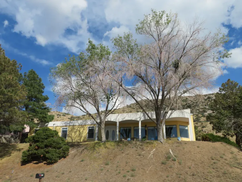 House against the Sandia mountains - Image 1