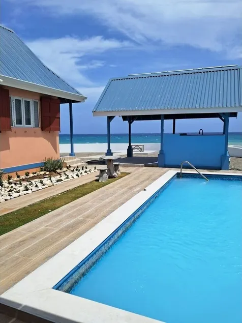Timeless - Lovely beach cottage. Private pool, ocean view, beach access. R &R ! - Image 1