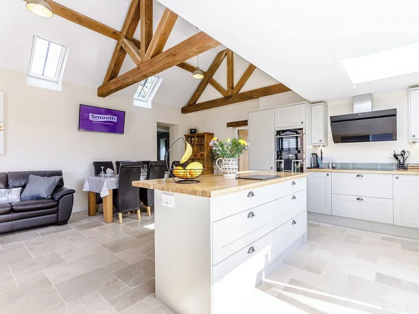 In this stunning cottage, the serene country life of Cotswold awaits you. - Image 1