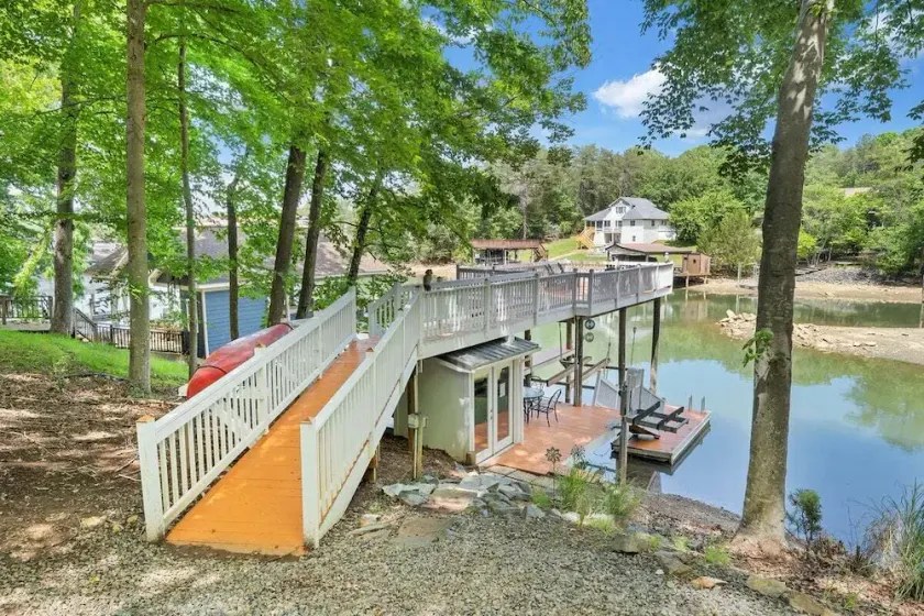 Lakefront Tranquility - Lakefront home with views, private hot tub/dock, deck, Free Wifi - Image 1