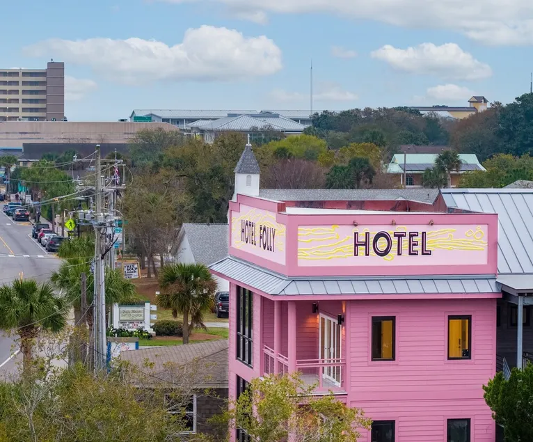 Boutique Hotel Folly Room 5: King Deluxe Studio - cozy porch views of the Folly River ADA - Image 1