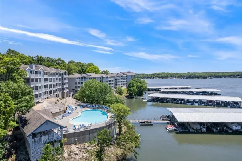 Lakefront Condo with 2 Pools, Courts, Trails & Patios at 12MM - Image 1