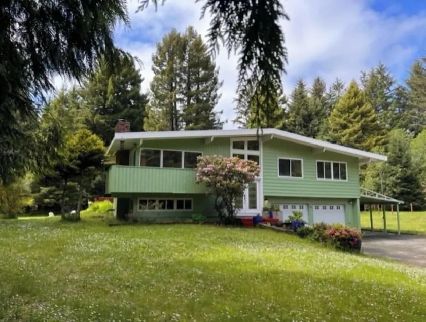 Private mid-century modern hideaway in forest near the river and sea. - Image 1
