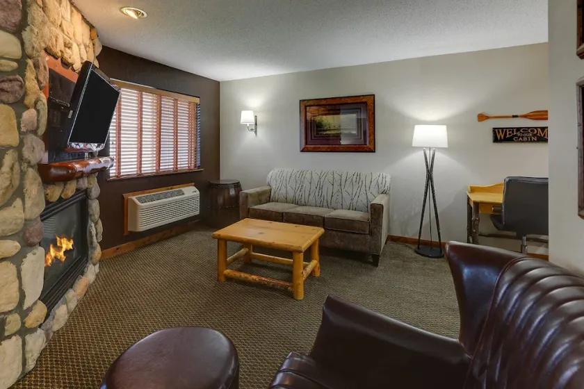Riverside Getaway: Elegant Suites & Warm Woodland Decor | 2 Units - Image 1