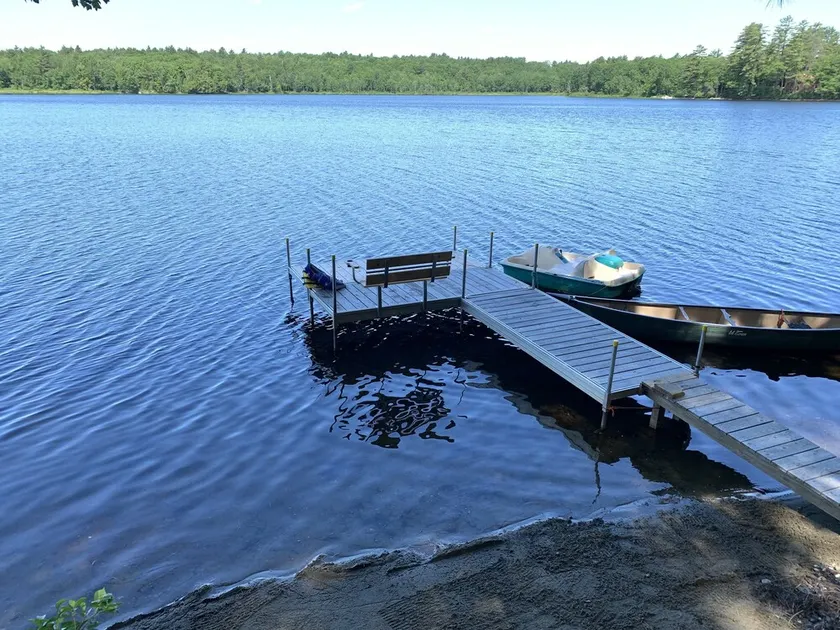 Lake House with Swim Area, Dock, Deck, Canoe, & Paddle Boat  - 1BR+, Sleeps 4-6 - Image 1