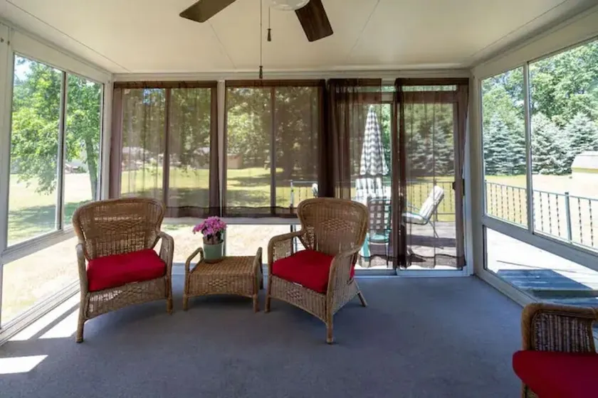 Comfy, Cozy 3-Bedroom Home with Sunroom and Patio - Image 1