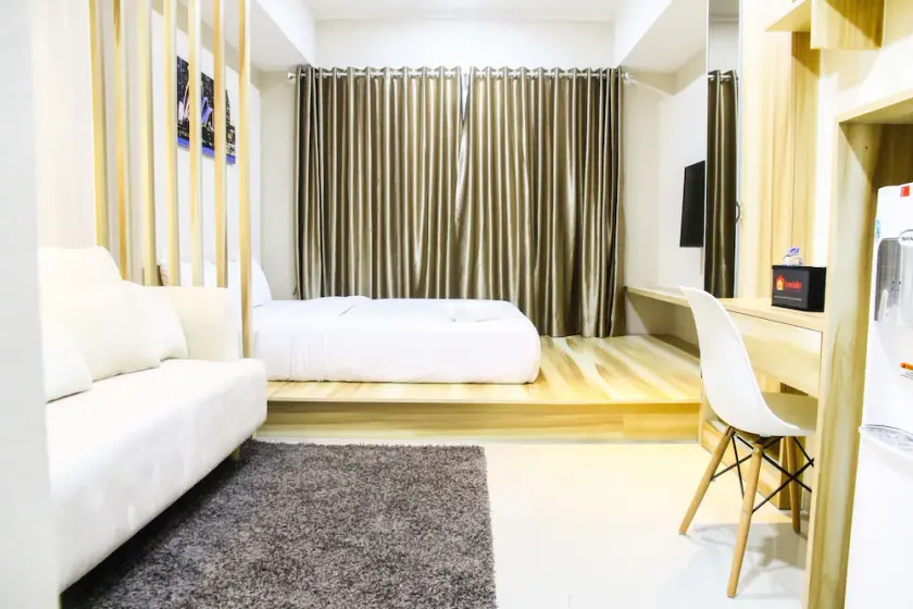 Modern Style The Oasis Studio Apartment with Comfortable Sofa - Image 1
