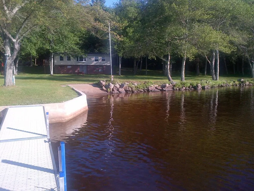 New England Lake Cottage On Long Pond on over 20 Wooded Acres - Image 1
