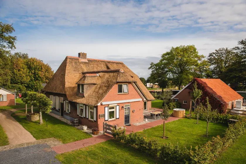 This 14-person group home has everything, even a hot tub and sauna! - Image 1