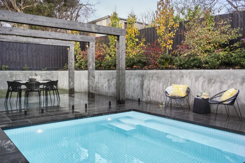 Architecturally designed coastal home with heated pool & toasty fireplace - Image 1