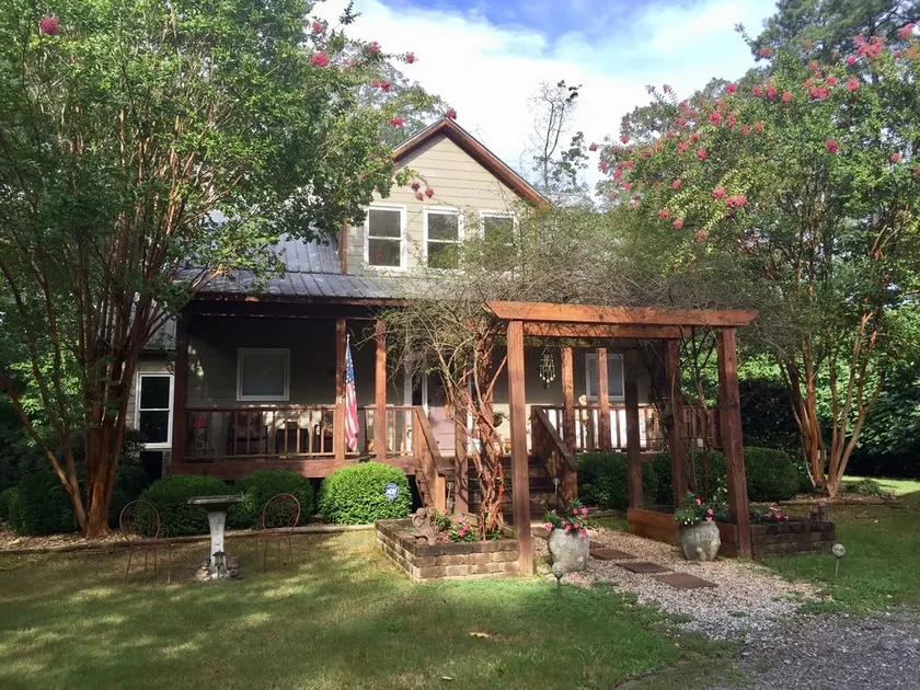 3+ acres of woods and lake - Image 1