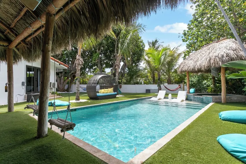 EAST of A1A WITH Private Beach Guest house, Heated Pool, AND 6 seater Golf Cart! - Image 1