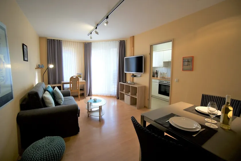 Aconchegante apartamento de 2 quartos - varanda, Wi-Fi, TV, perto do centro da cidade - Image 1