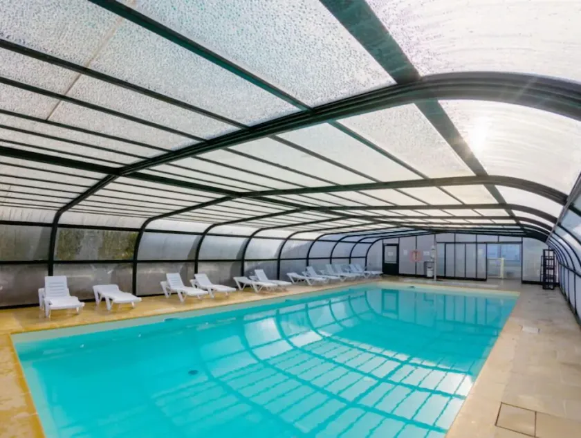 Kun en kort gåtur til stranden | Modest Duplex + fælles adgang til indendørs pool - Image 1