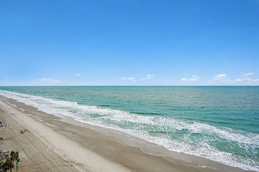 Appartement en copropriété avec jacuzzi et piscine chauffée | Vue plage - Image 1