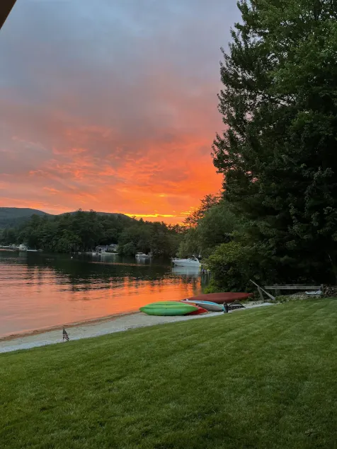 A quiet cove, the sunset and a sandy beach, on Lake Winnipesaukee - Image 1