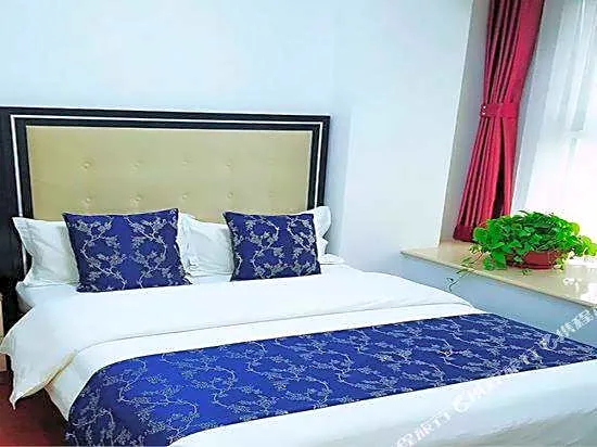 Guan County Hong Pu Traders Hotel - Image 1