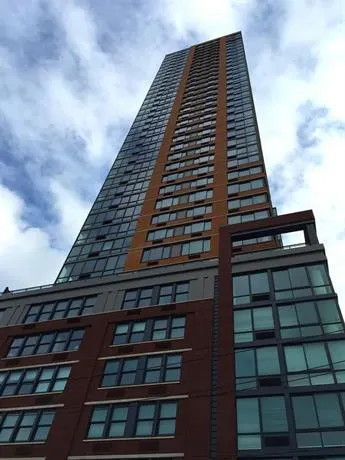 Liberty Towers by Dharma Home Suites - Image 1