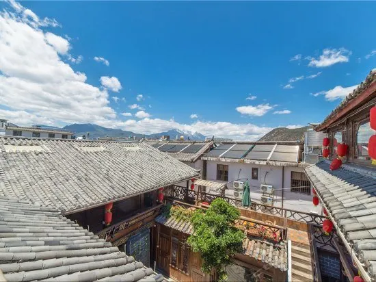 Old Town of Lijiang Big Waterwheel · Yimeng Chenfeng Rizhao Jinshan Snow Mountain Scenic Inn - Image 1