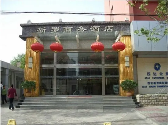 Xinluo Business Hotel - Image 1