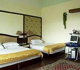 Mingcheng Yiyuan Hotel - Image 1
