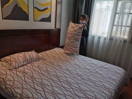 SHENGXING LONGDU HOTEL - Image 1