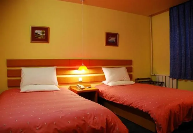 Home Inn Xinghai Square - Dalian - Image 1