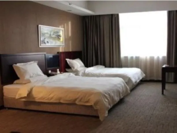 Huanlian Lucaihuang Business Hotel - Image 1