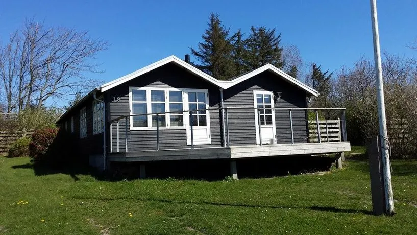 Holiday home with terrace & jacuzzi | Water view - Image 1