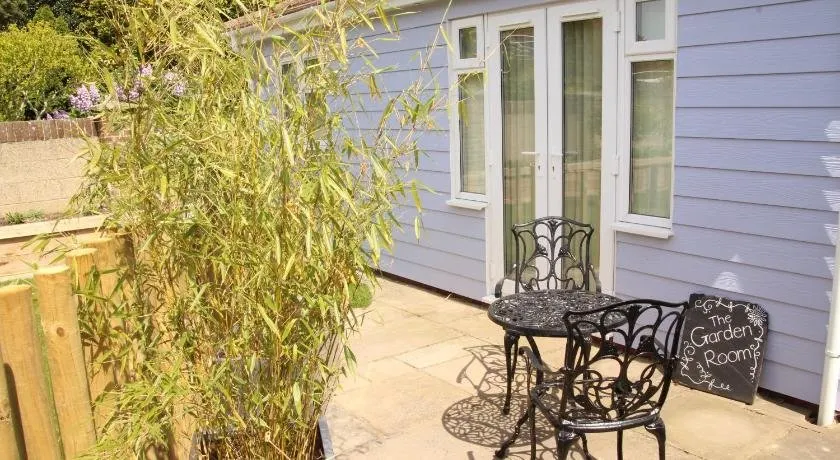 The Garden Room Pagham - Image 1