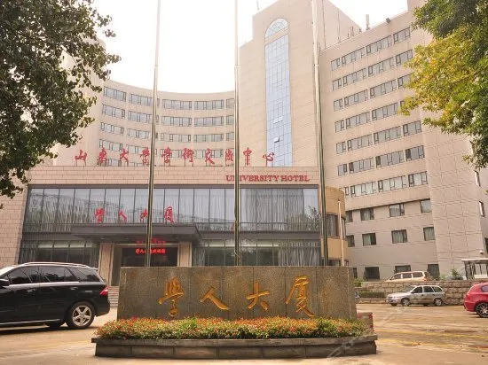 XUEREN MANSION HOTEL - Image 1