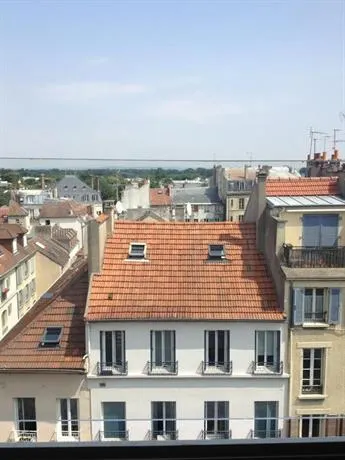 Vue sur les toits - Image 1