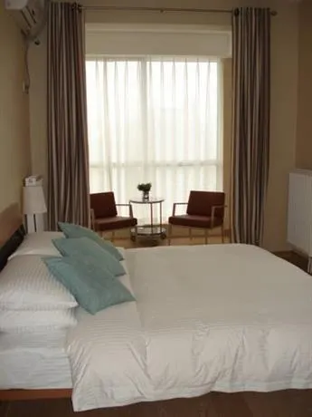 Harbour Plaza Deluxe Serviced Apartments - Image 1