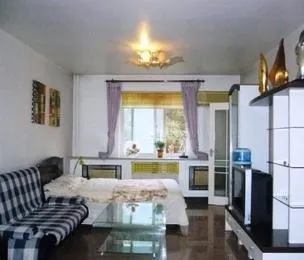 Aijia Apartment Hotel Puhuangyu - Image 1