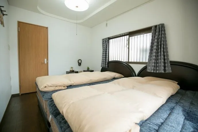 Takematsu Sunny Guesthouse Near Kansai Airport - Image 1