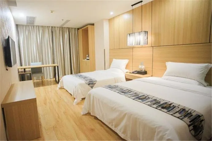 YUNCHENG BUSINESS HOTEL - Image 1
